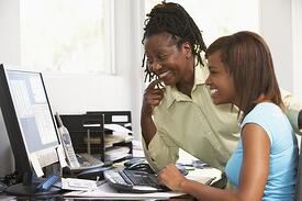 mom and teen on computer