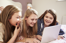 teens on laptop