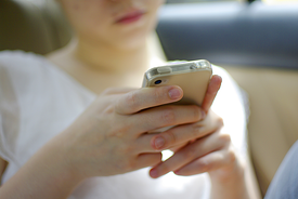 teen on phone