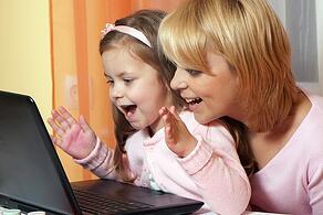 mom and child on computer