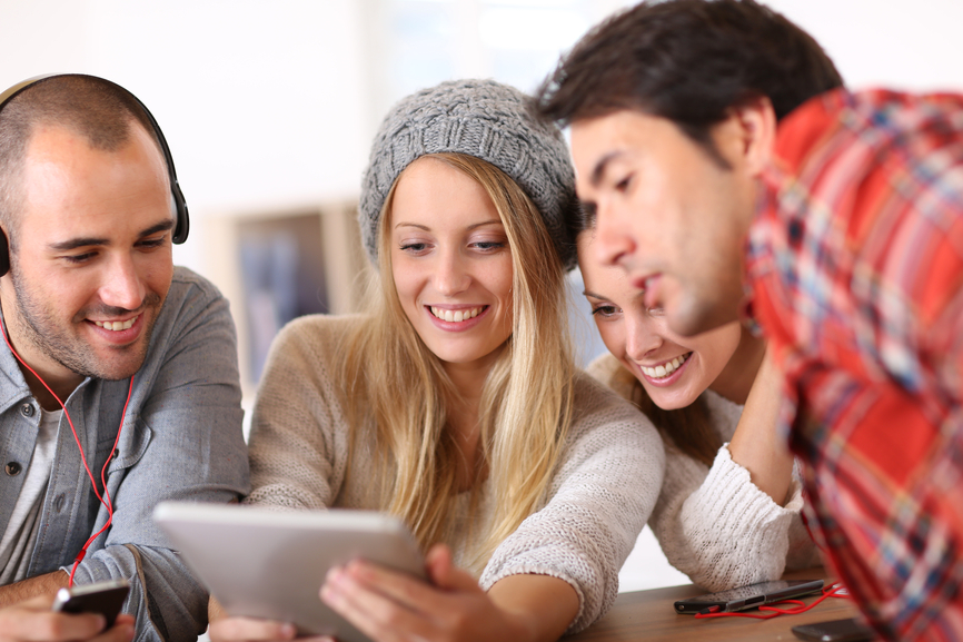 Most of teenagers use to listen. Usingteens гража. Group of Happy young students in High quality. Teens using mobiles.