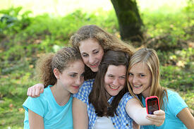 teens taking a selfie